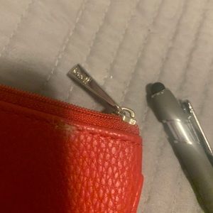 Red pebbled clutch from 31
